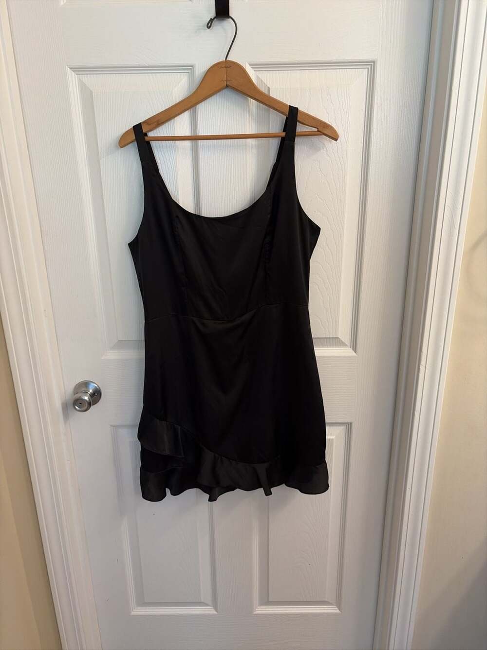 Le Lis Collection Black Satin Sleeveless Mini Dress with Ruffle Hem